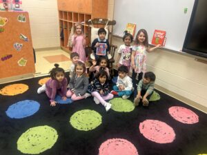 Students listing to book